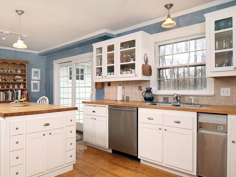 Renovated kitchen with new kitchen cabinets and appliances.